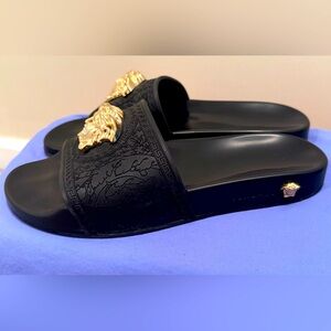 Versace Black and Gold Sandals with Embossed Strap